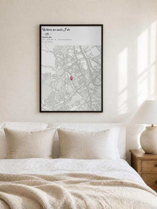 Wedding map print of St. Mary's Cathedral, Kilkenny, framed above a bed