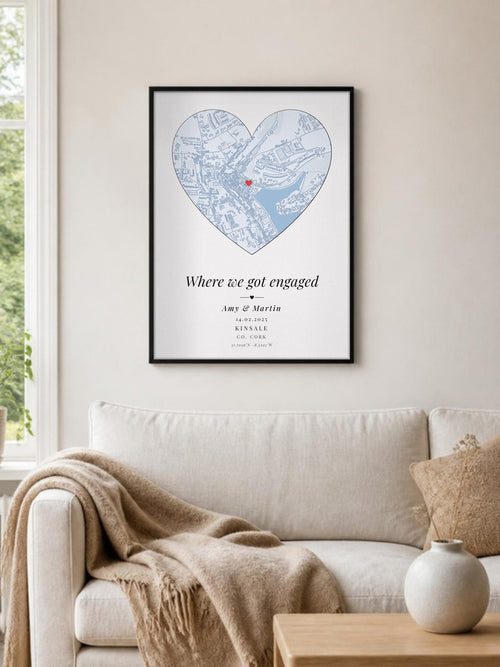 Personalised heart map of Kinsale, 'Where we got engaged', framed above a linen sofa
